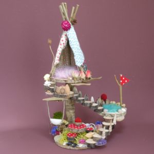 Naturemake model of their Mini Teepee Fairyhouse kit